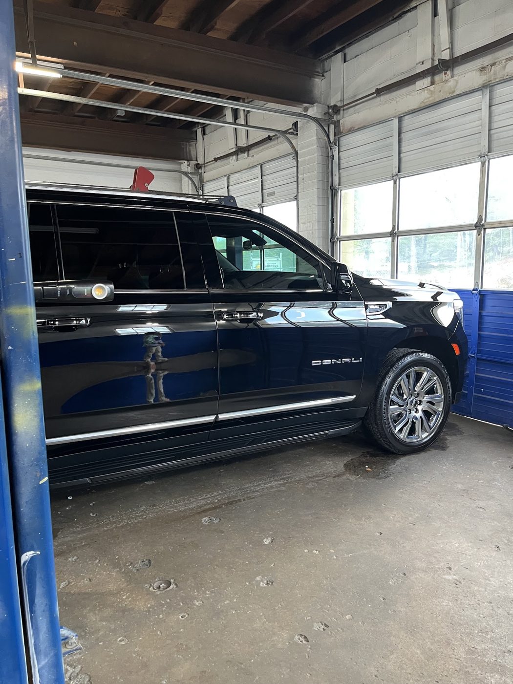 Dark SUV in the bay